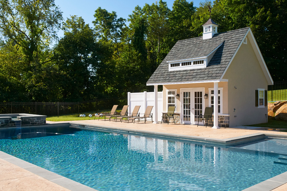 Design ideas for an arts and crafts pool in Other with a pool house.