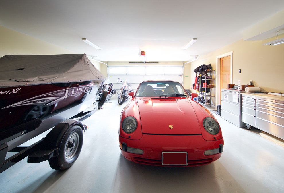This is an example of a large traditional attached two-car carport in Vancouver.