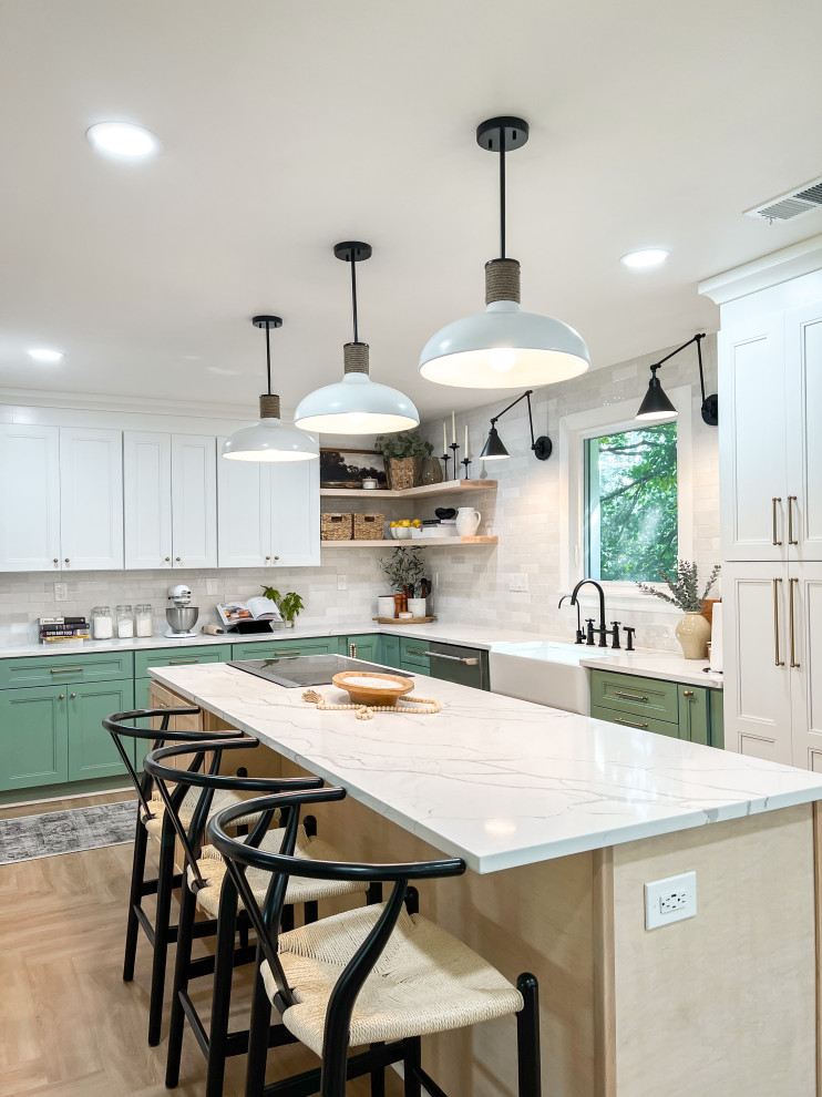 Design ideas for a large u-shaped eat-in kitchen in DC Metro with a farmhouse sink, shaker cabinets, green cabinets, quartzite benchtops, white splashback, porcelain splashback, stainless steel appliances, vinyl floors, with island, beige floor, white benchtop and coffered.