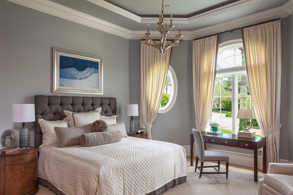 Inspiration for a traditional bedroom in Miami with grey walls, carpet and beige floor.