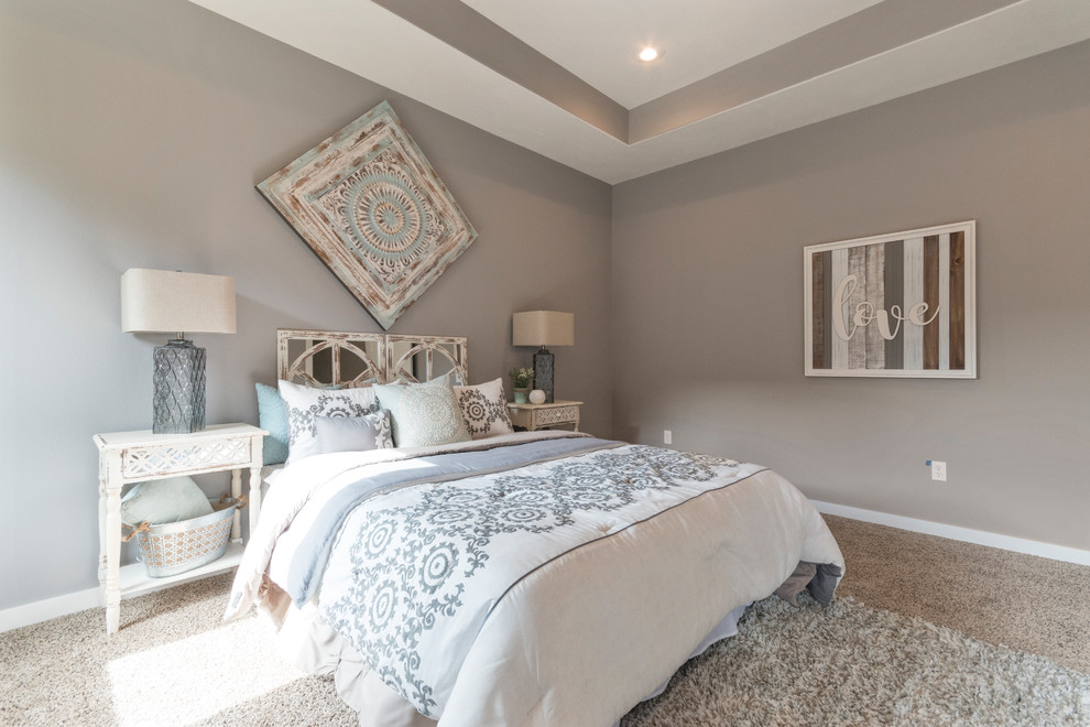 This is an example of a large country master bedroom in Other with grey walls, carpet, no fireplace and beige floor.