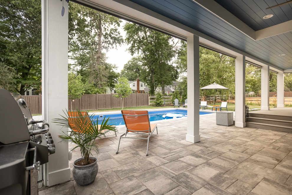 Pool - large transitional backyard rectangular lap pool idea in Cincinnati
