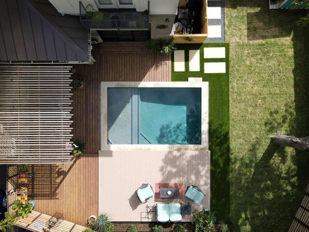 Small side yard pool photo in Austin