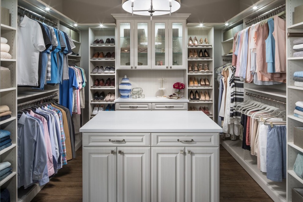 Inspiration for a large contemporary gender-neutral dressing room in Seattle with raised-panel cabinets, white cabinets, dark hardwood floors and brown floor.
