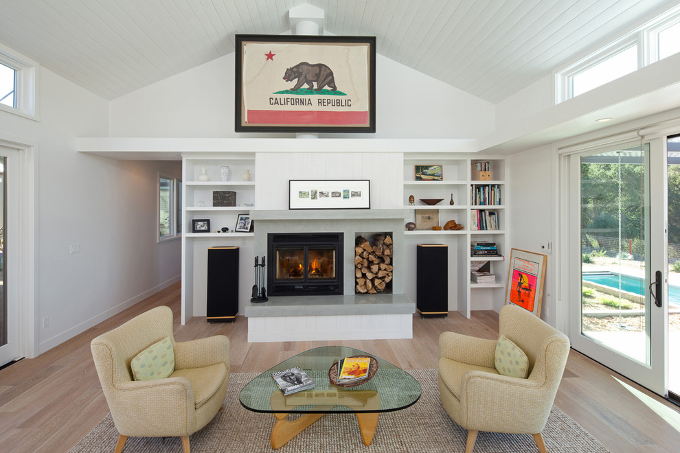 Inspiration for a country living room in San Luis Obispo with white walls and a standard fireplace.