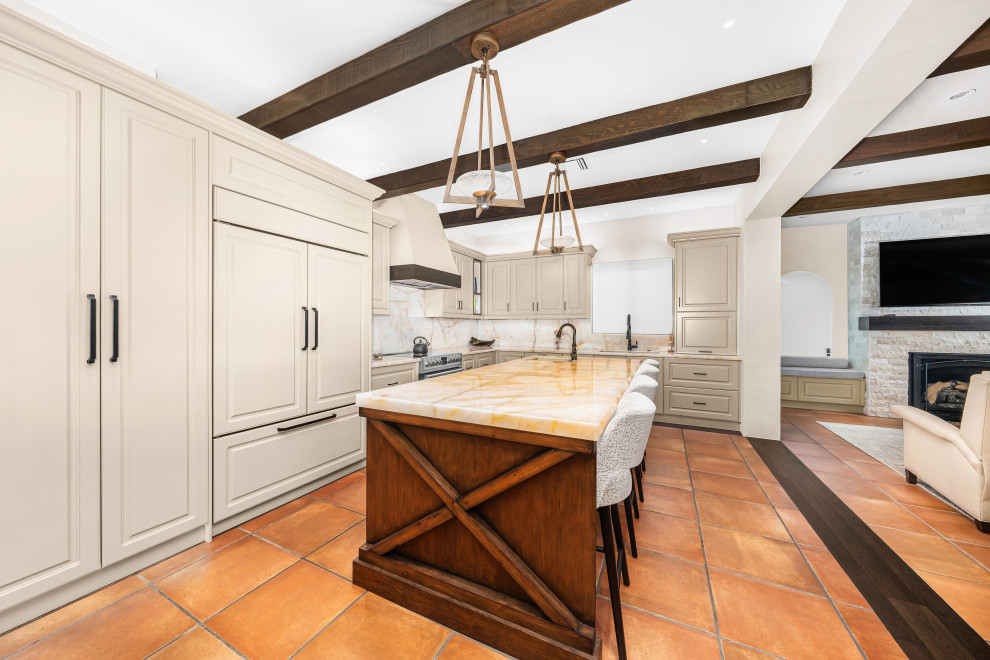 Large transitional kitchen photo in Miami with an island