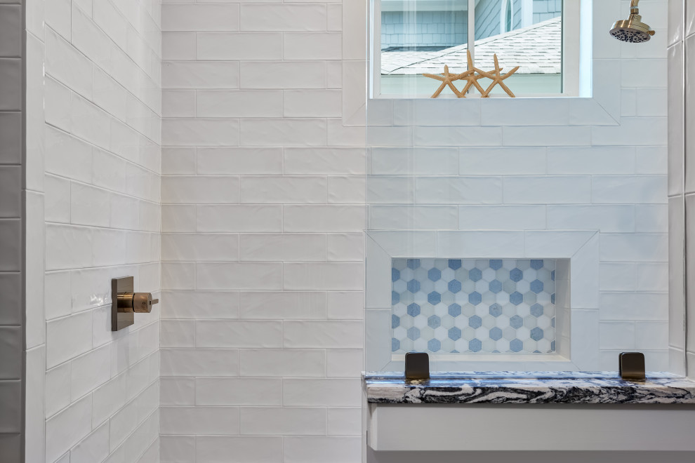 This is an example of a large beach style kids bathroom in Charleston with an open shower, white tile, subway tile, white walls and an open shower.