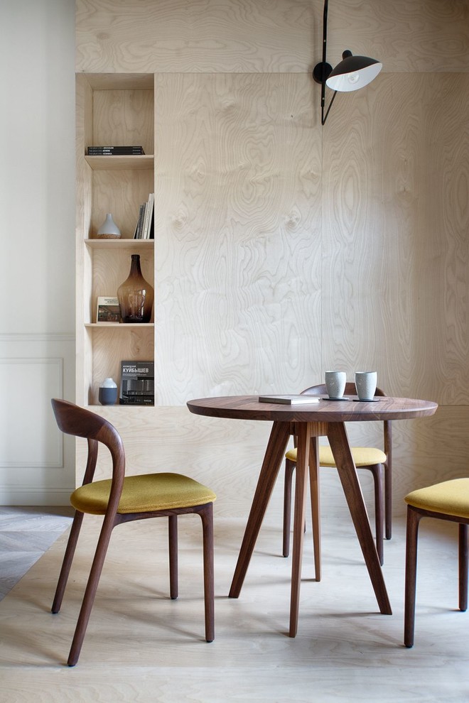 Inspiration for a large scandinavian dining room in Saint Petersburg with white walls, plywood floors and beige floor.
