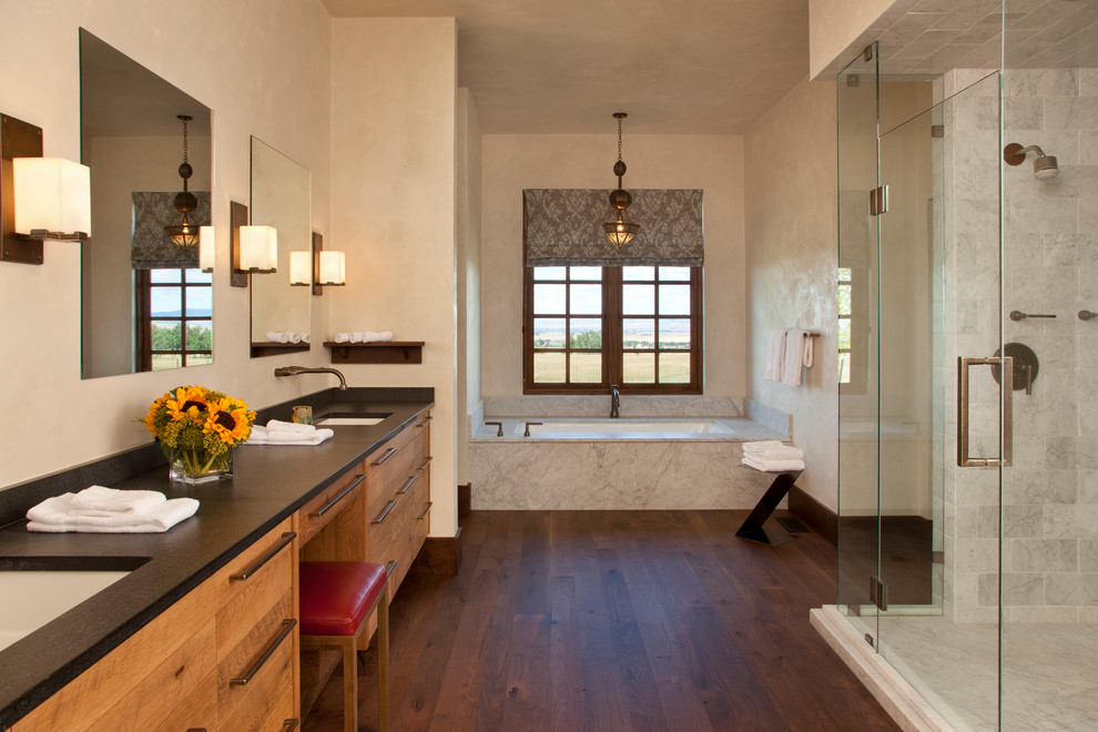 Inspiration for a large master bathroom in Other with an undermount sink, flat-panel cabinets, light wood cabinets, quartzite benchtops, a drop-in tub, an open shower, white tile, ceramic tile, beige walls and medium hardwood floors.
