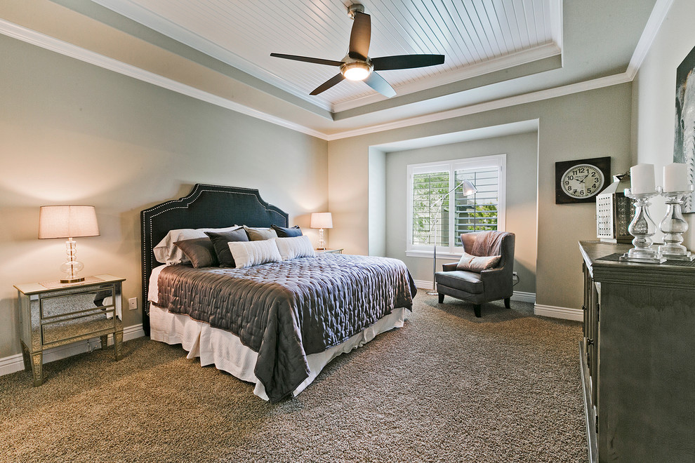 This is an example of a mid-sized arts and crafts master bedroom in Salt Lake City with grey walls, carpet and brown floor.