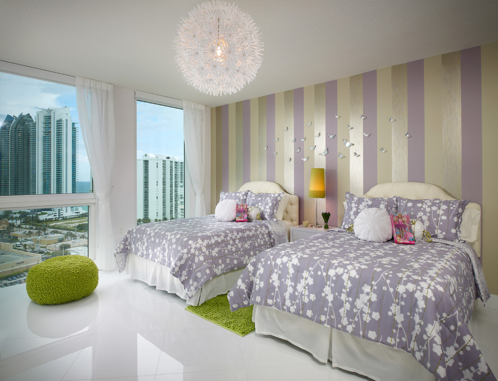 This is an example of a mid-sized contemporary kids' bedroom for girls and kids 4-10 years old in Miami with ceramic floors, white floor and multi-coloured walls.