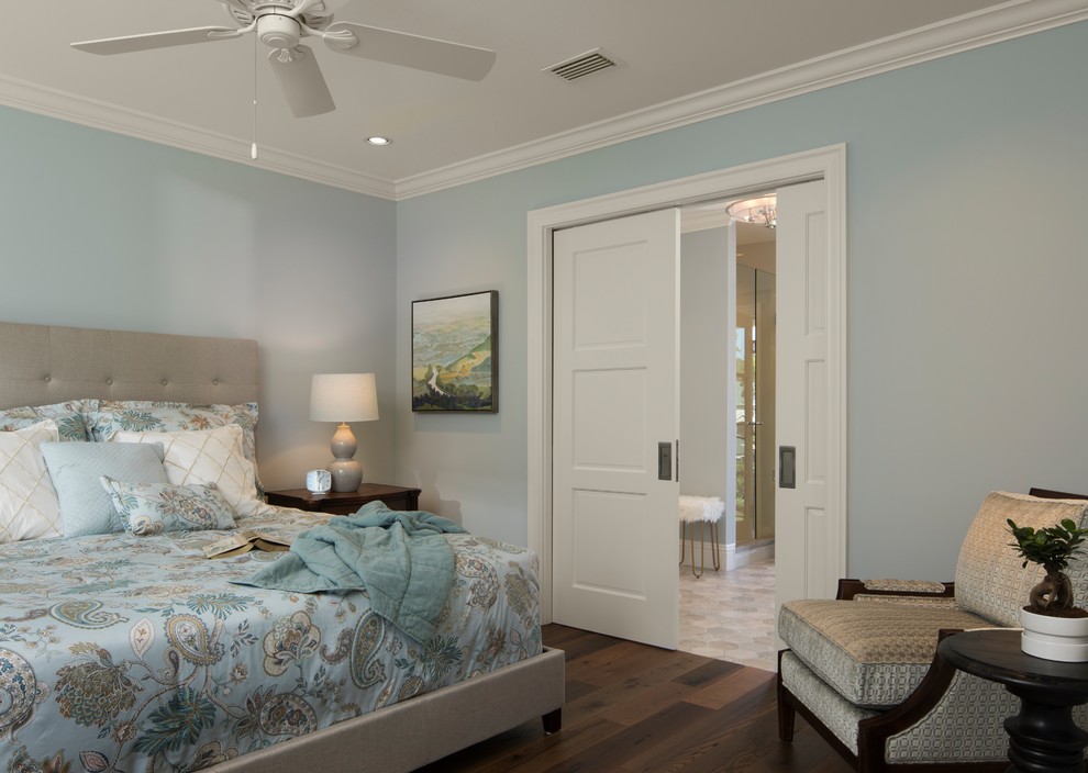 This is an example of a transitional bedroom in Denver.