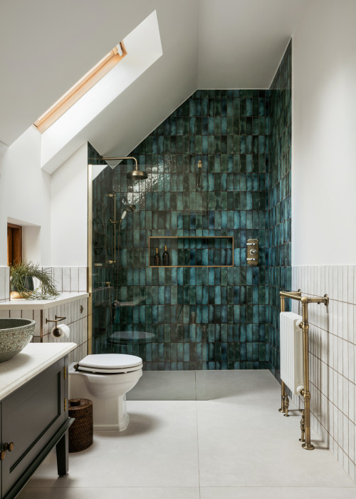 Spa-Like Ambiance with Glazed Ceramic Tile Shower and Brass Fixtures