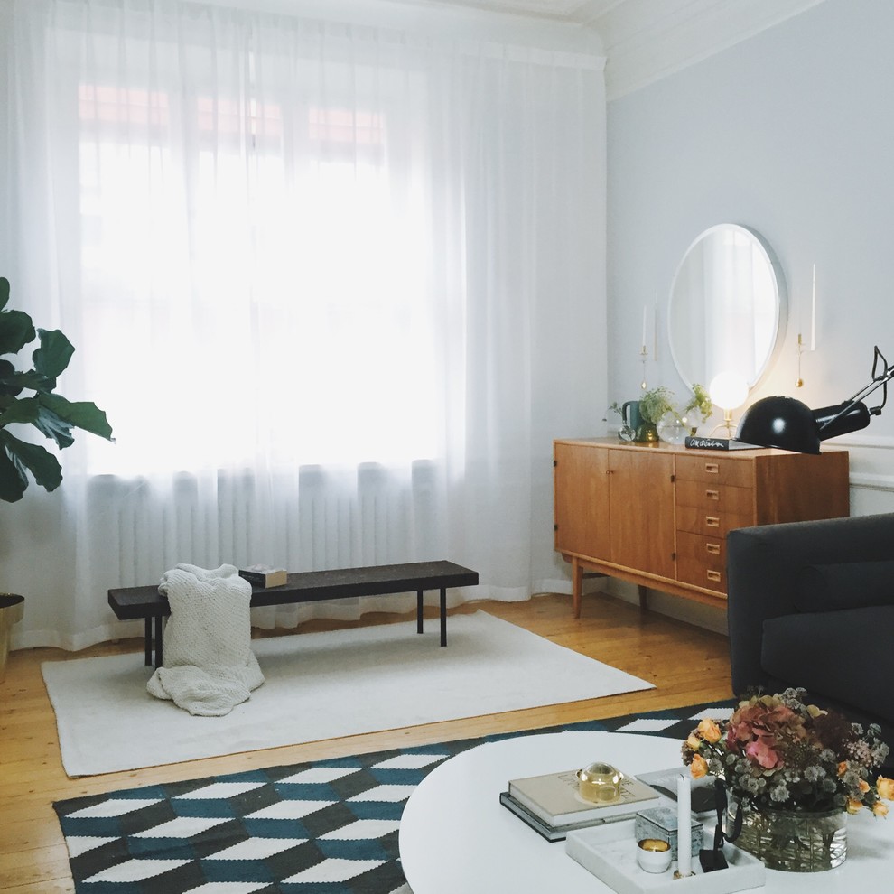 Inspiration for a midcentury living room in Stockholm.