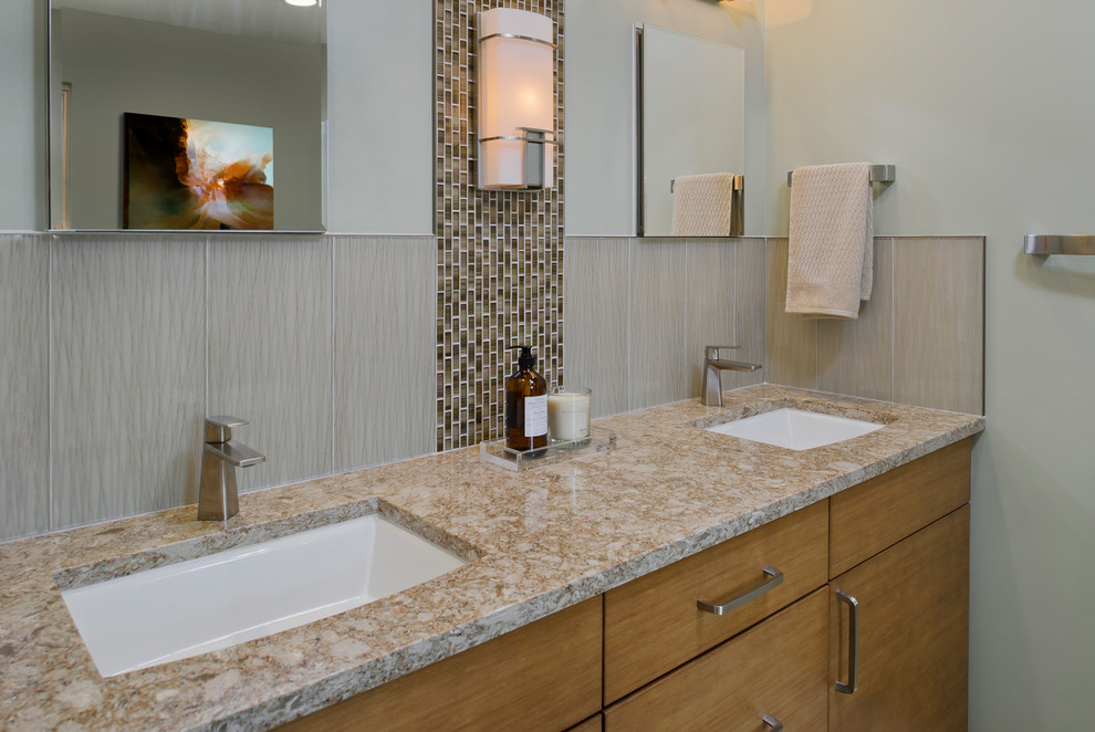Mid-sized transitional master bathroom in Baltimore with flat-panel cabinets, medium wood cabinets, a freestanding tub, an alcove shower, a two-piece toilet, beige tile, porcelain tile, green walls, porcelain floors, an undermount sink, engineered quartz benchtops, beige floor and a hinged shower door.