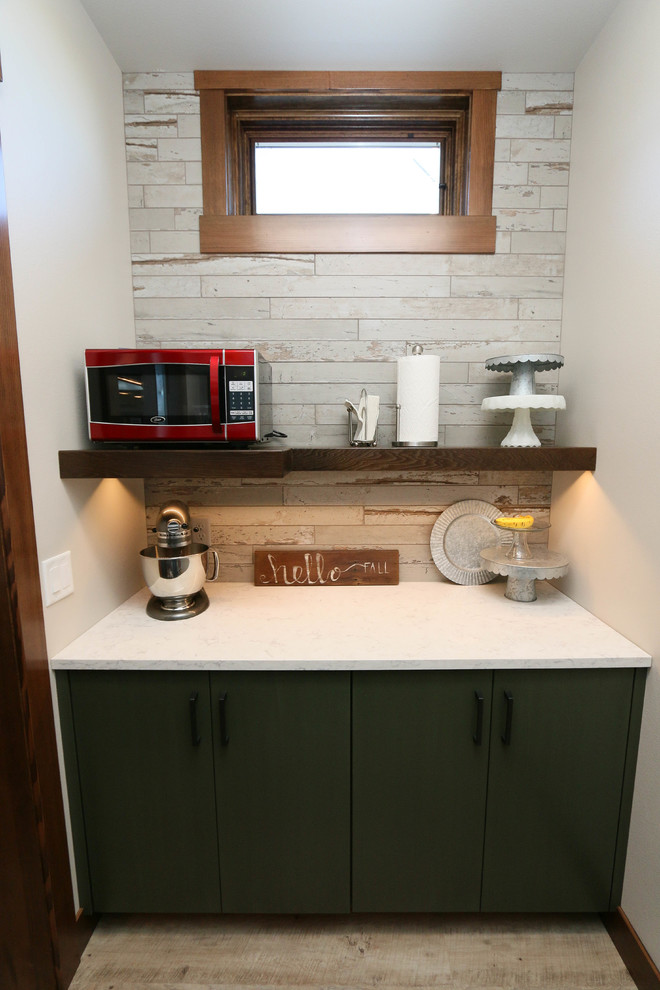 Kitchen pantry - eclectic vinyl floor kitchen pantry idea with flat-panel cabinets, green cabinets, solid surface countertops and gray backsplash