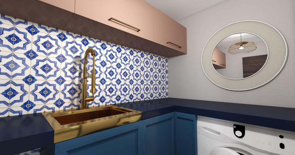 Inspiration for a small eclectic l-shaped dedicated laundry room in Los Angeles with a farmhouse sink, shaker cabinets, blue cabinets, quartz benchtops, multi-coloured splashback, ceramic splashback, beige walls, an integrated washer and dryer and blue benchtop.
