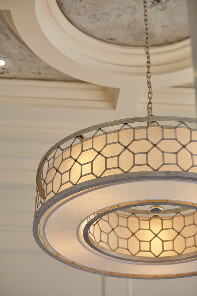 Inspiration for a large transitional foyer remodel in Toronto with white walls
