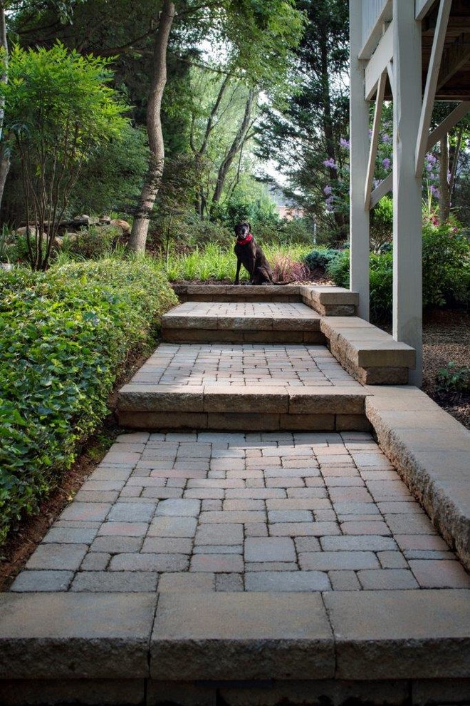 Design ideas for a traditional patio in Charlotte with concrete pavers.