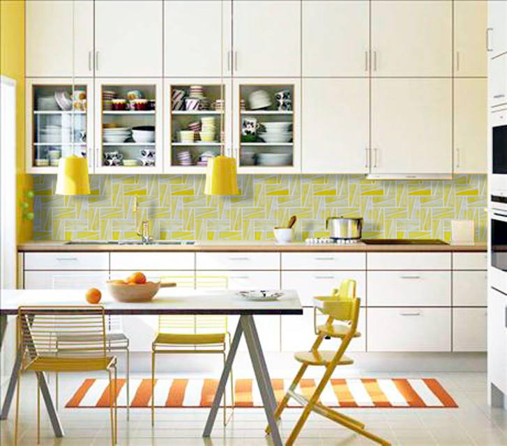 Photo of a mid-sized modern single-wall eat-in kitchen in Gold Coast - Tweed with white cabinets, yellow splashback, a double-bowl sink, glass tile splashback, glass-front cabinets, laminate benchtops, white appliances, porcelain floors, no island, white floor and brown benchtop.
