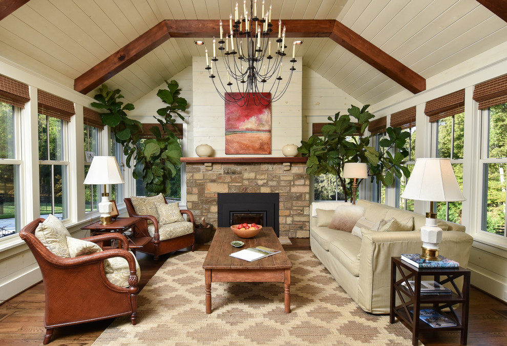 Design ideas for a traditional formal living room in Other with dark hardwood floors, a standard fireplace, brown floor and beige walls.