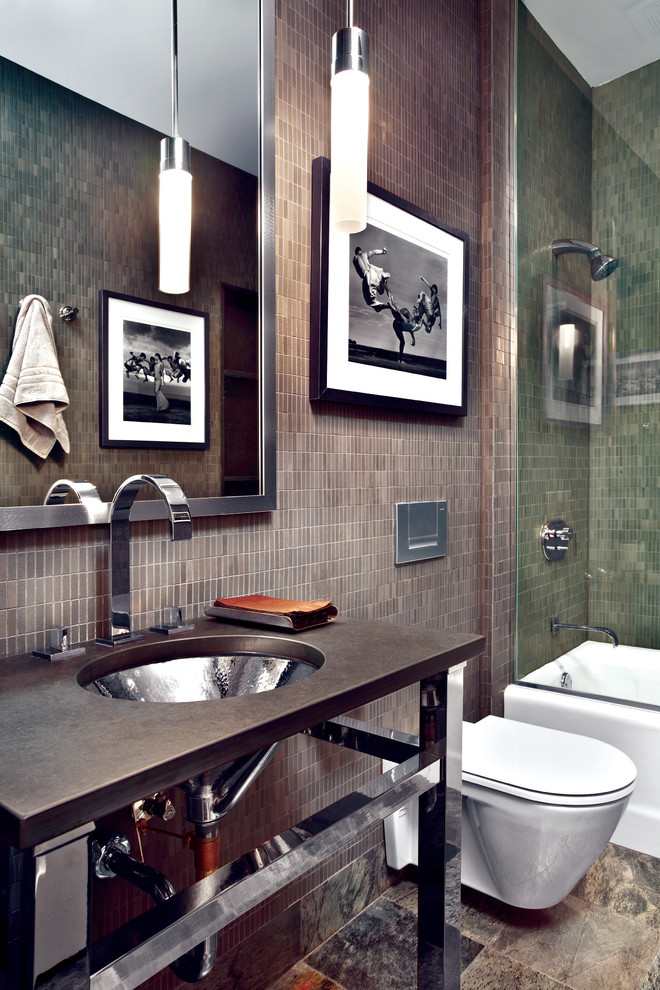 This is an example of a contemporary bathroom in Chicago with a wall-mount toilet and a console sink.