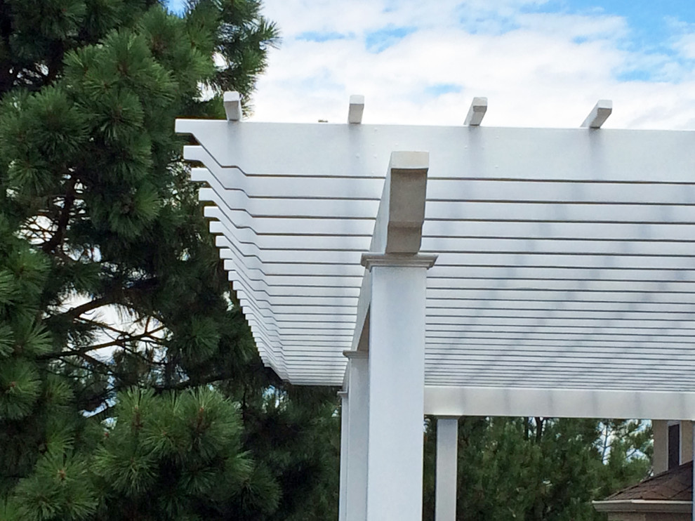 Mid-sized transitional backyard deck photo in San Diego with a pergola