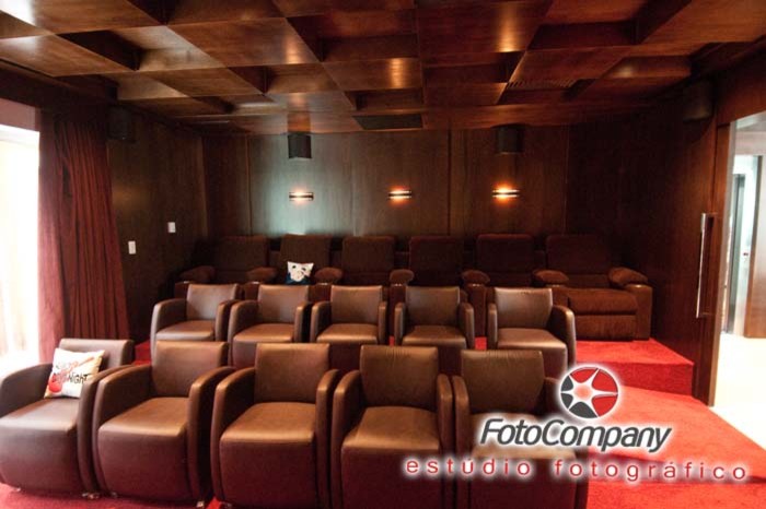 This is an example of a large contemporary home cinema in Other.