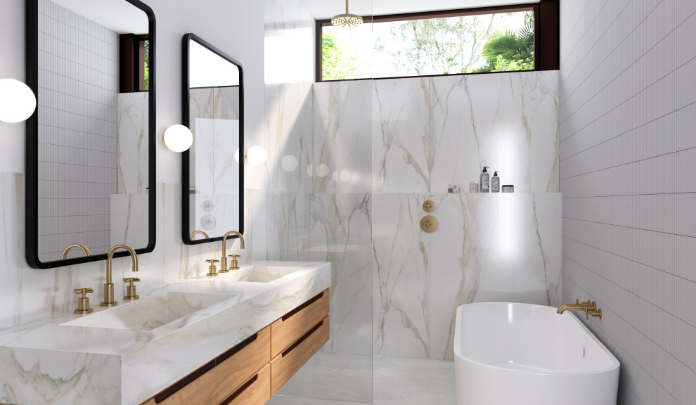 Photo of a mid-sized midcentury bathroom in Miami with flat-panel cabinets, medium wood cabinets, an open shower, white tile, stone slab, marble benchtops, an open shower and white benchtops.