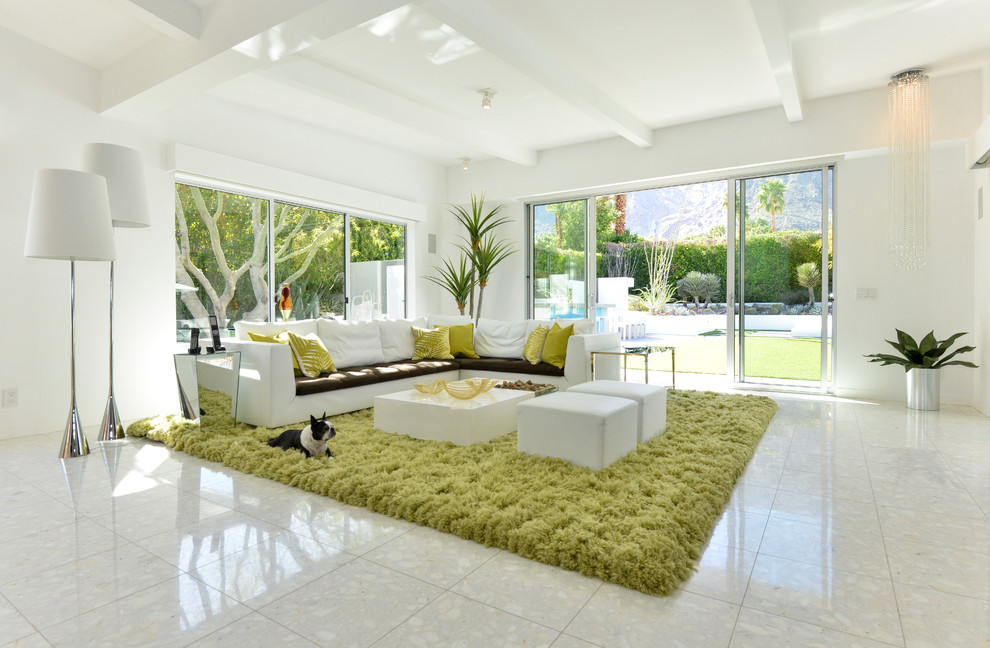 Design ideas for a midcentury open concept living room in Los Angeles with white walls.