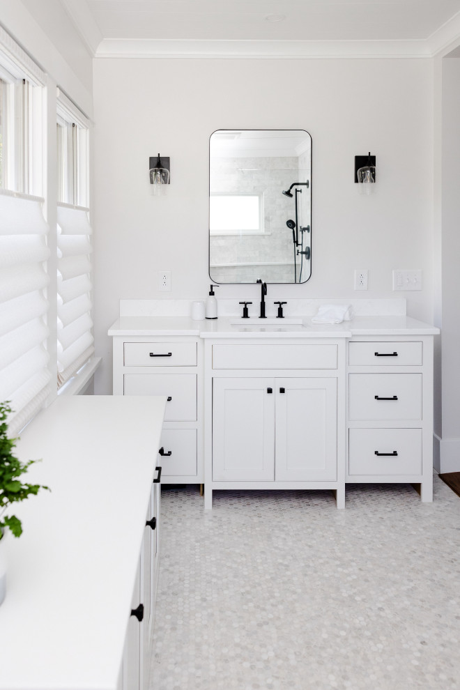 Photo of a large arts and crafts master bathroom in New York with beaded inset cabinets, white cabinets, an open shower, a two-piece toilet, white tile, marble, white walls, marble floors, an undermount sink, engineered quartz benchtops, white floor, white benchtops, a shower seat, a single vanity, a built-in vanity and timber.
