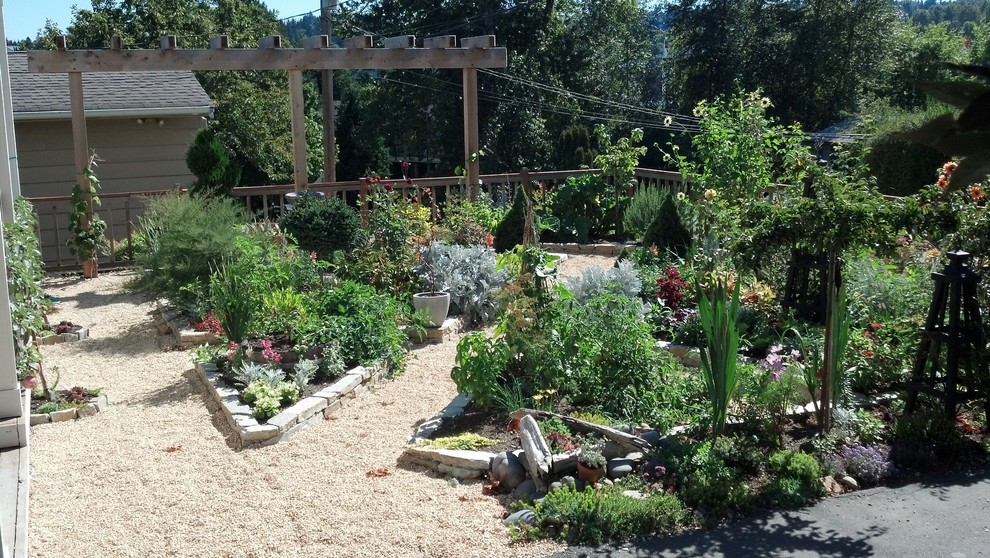 Inspiration for a small eclectic partial sun front yard gravel garden path in Seattle for winter.