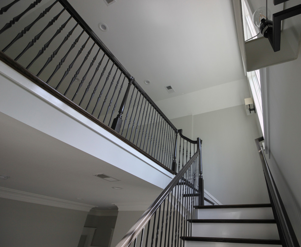 Staircase - large transitional wooden l-shaped mixed material railing staircase idea in DC Metro with painted risers