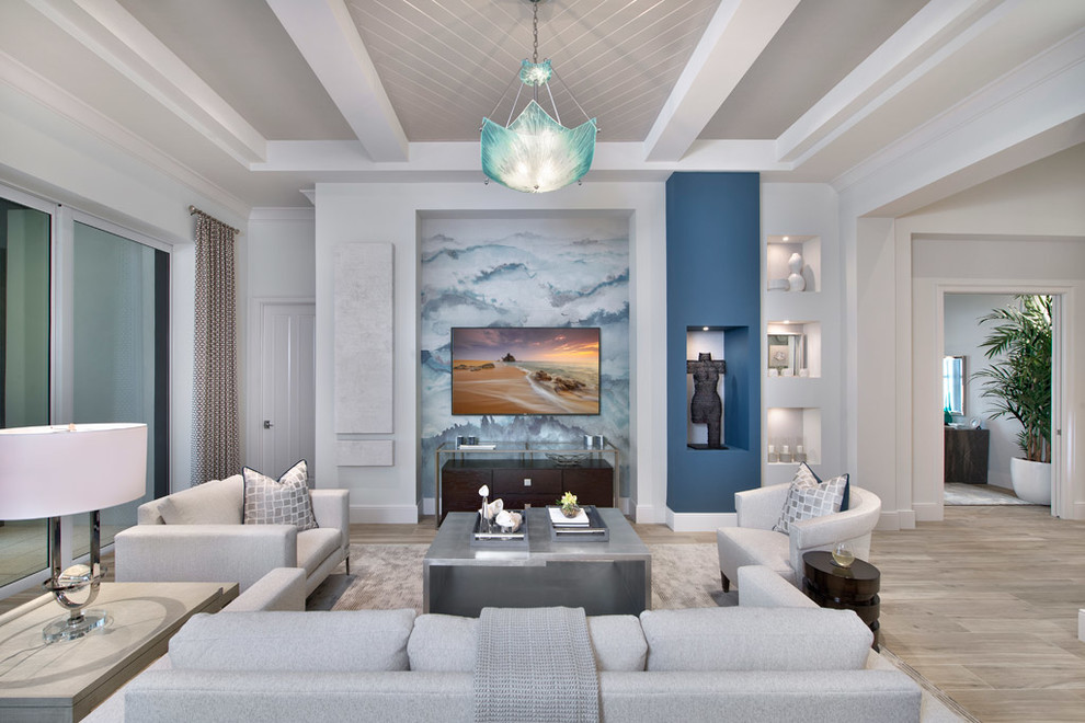 Beach style beige floor family room photo with yellow walls, no fireplace and a wall-mounted tv