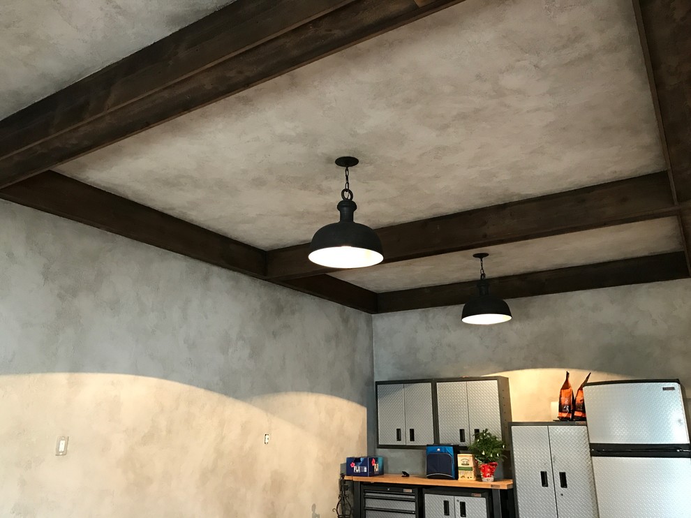 Example of a mountain style garage design in Omaha