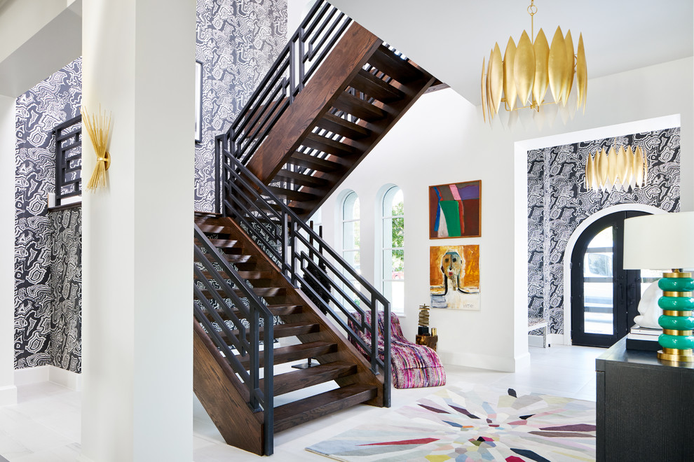 Mid-sized modern wood l-shaped staircase in Dallas with open risers and metal railing.