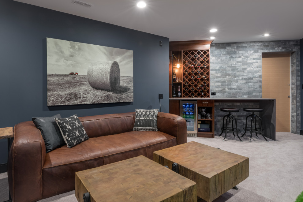 Inspiration for a mid-sized contemporary single-wall seated home bar in Vancouver with grey splashback, stone tile splashback, carpet, grey floor and grey benchtop.