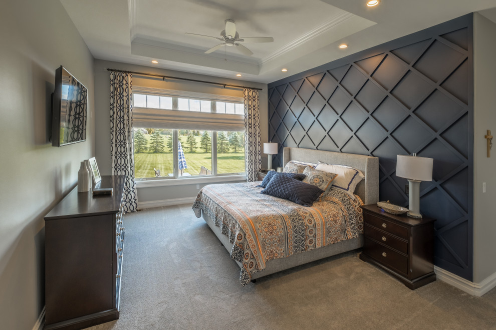 Photo of a mid-sized country master bedroom in Detroit with multi-coloured walls, carpet and beige floor.
