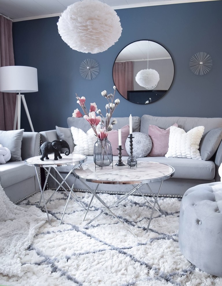 Inspiration for a transitional living room in Other with blue walls and white floor.