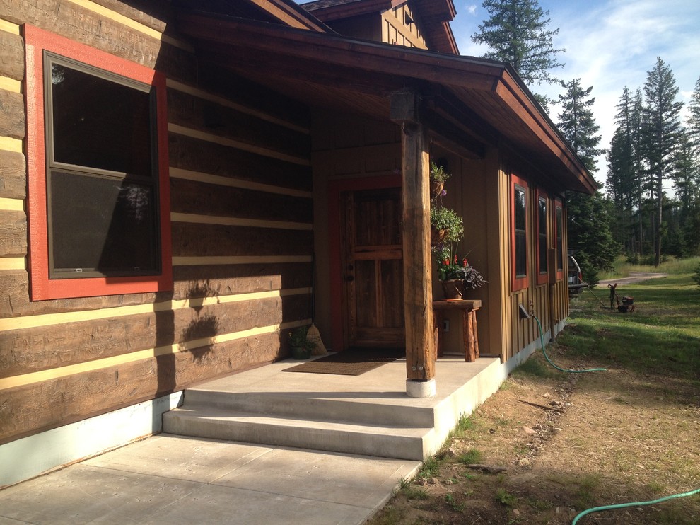 Mid-sized rustic brown two-story wood gable roof idea with a shingle roof