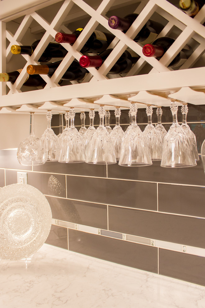 Kitchen - transitional kitchen idea in Cedar Rapids with quartz countertops, subway tile backsplash and gray backsplash