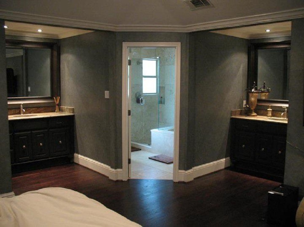 This is an example of a mid-sized transitional bathroom in Dallas with dark wood cabinets, granite benchtops, a corner shower, grey walls and dark hardwood floors.