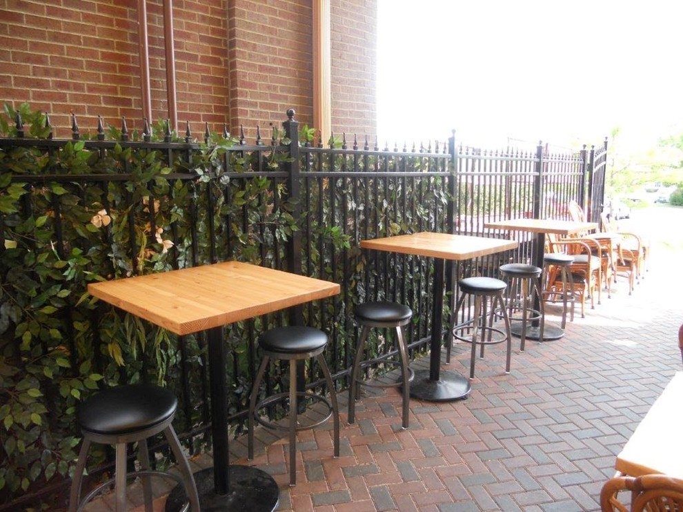 Large transitional backyard brick patio photo in Chicago with no cover