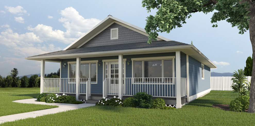 Design ideas for a small traditional one-storey blue exterior in Vancouver with concrete fiberboard siding and a hip roof.