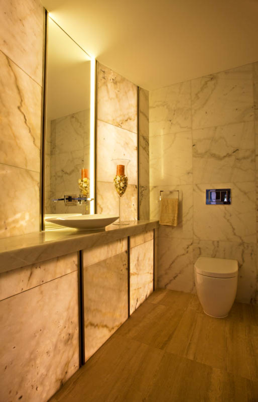 Design ideas for a large powder room in Perth with a one-piece toilet, multi-coloured tile, marble, multi-coloured walls, marble floors, a pedestal sink, marble benchtops and multi-coloured floor.