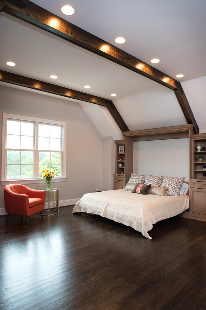 Mid-sized country guest bedroom in Charlotte with dark hardwood floors, grey walls, no fireplace and brown floor.