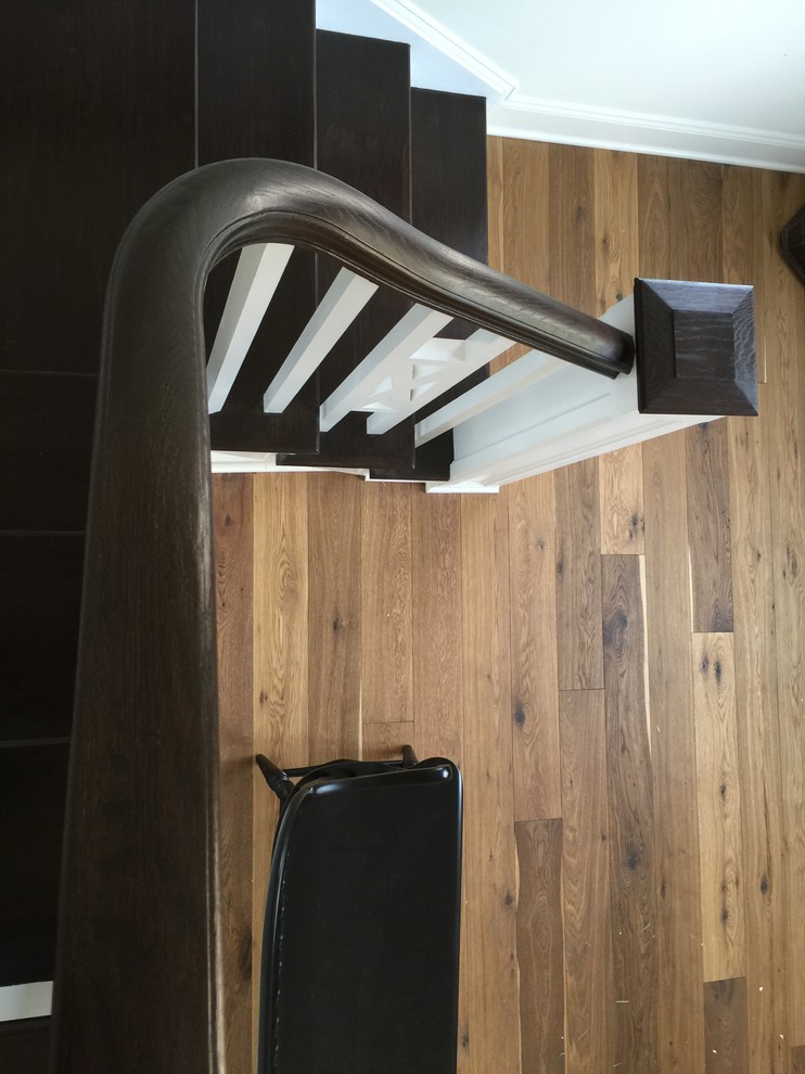 Inspiration for a small country wood l-shaped staircase in DC Metro with wood risers and wood railing.