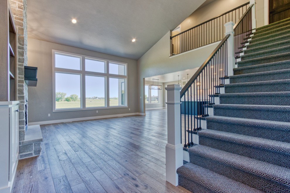 Transitional carpeted straight mixed material railing staircase photo with carpeted risers