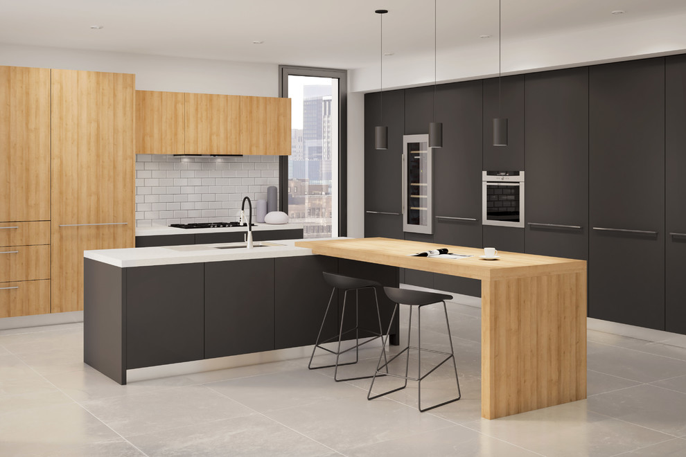Large modern l-shaped eat-in kitchen in Montreal with an undermount sink, flat-panel cabinets, beige cabinets, wood benchtops, white splashback, subway tile splashback, stainless steel appliances, porcelain floors, multiple islands and beige floor.