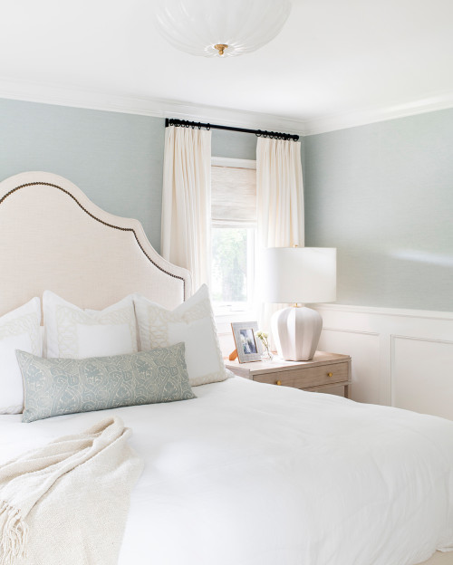 traditional bedroom in cream and light blue colors